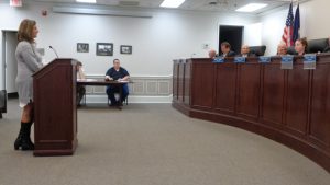 EDA Executive Director Jennifer McDonald, at podium, and Councilwoman Bébhinn Egger squared off on exactly what ITFederal LLC is; and what it is planning here, during the Oc-tober 24 Town Council Meeting.