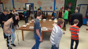 The Cake-Walk is SO popular, even those coming off leg injuries get into the action - to a tension-building piano accompaniment provided by Eric Olson.