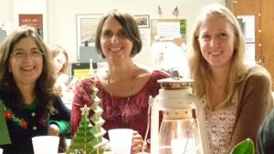 BREC staffers and friends, from left, Diane Eiserman, Paula Conrow and Diane’s daughter Leanna, pause between entertainment, socializing, Silent Auctioning, Cake-Walking and dinner.